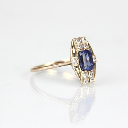 304 - An Art Deco style untested sapphire ring, the central round cut untested sapphire within surround of... 