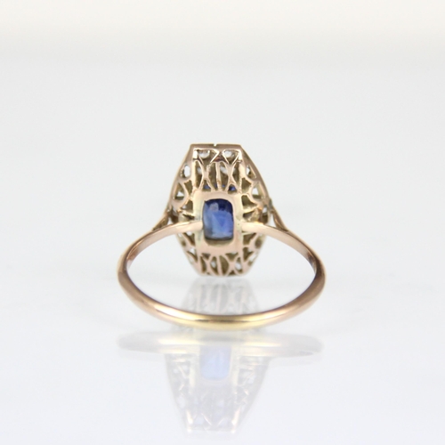 304 - An Art Deco style untested sapphire ring, the central round cut untested sapphire within surround of... 