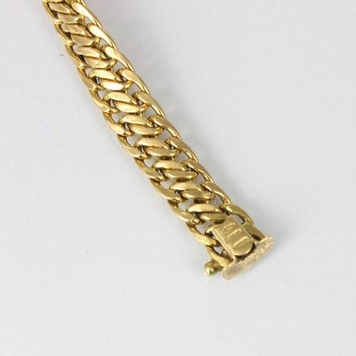 307 - A ‘Sadufa’ yellow metal fancy link bracelet, the stylised curb link bracelet with hidden box and ton... 