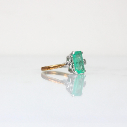 331 - An Edwardian style untested emerald and diamond three stone ring, the emerald cut untested emerald w... 