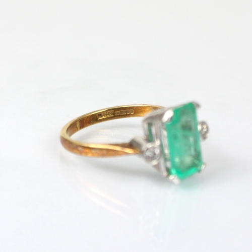 331 - An Edwardian style untested emerald and diamond three stone ring, the emerald cut untested emerald w... 