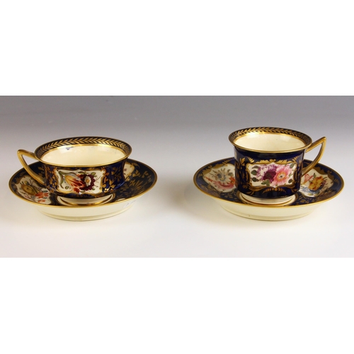 549 - A Spode porcelain coffee cup, early 19th century, the London shape cup with winged figural handle, t... 