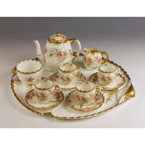 562 - An Aynsley quartet tea service in the 'Orchid' pattern, Rd No 145814, comprising: a serving tray wit... 