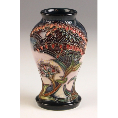 572 - A Moorcroft vase of small proportions in the Gypsy pattern designed by Rachel Bishop, of inverted ba... 