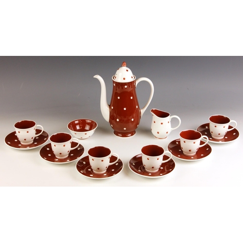 574 - A Susie Cooper coffee service, mid 20th century, comprising: a coffee pot and cover, 24cm high, six ... 