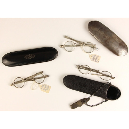 736 - A pair of George III silver spectacles, London 1796, of typical form with folding arms, to an associ... 