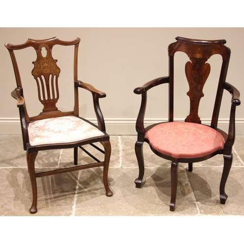 1007 - An Edwardian mahogany corner chair, the paper scroll top rail over a vase shaped splat, out swept ar... 