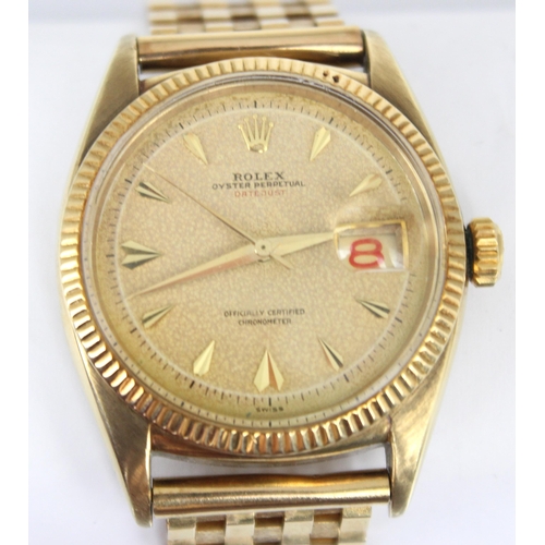 157 - A mid 20th century 9ct Rolex Oyster Perpetual Datejust 'Red' wristwatch, ref: 6305, the circular pat... 