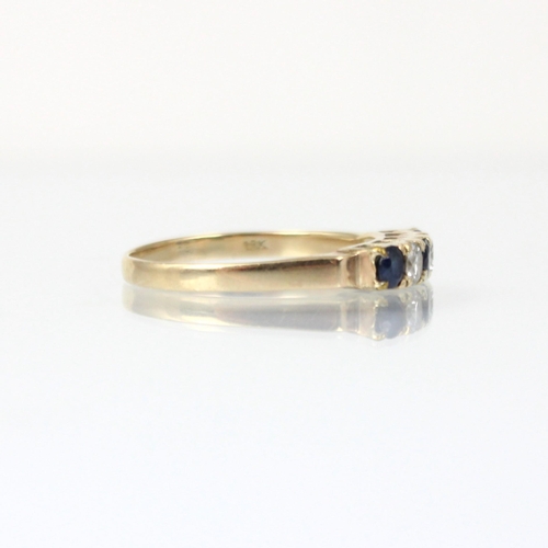 206 - An untested sapphire and diamond five stone ring, the round cut diamonds intersperced with three rou... 