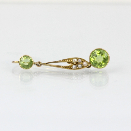 207 - A pair of early 20th century seed pearl and peridot 'day or night' earrings, the round cut peridot w... 