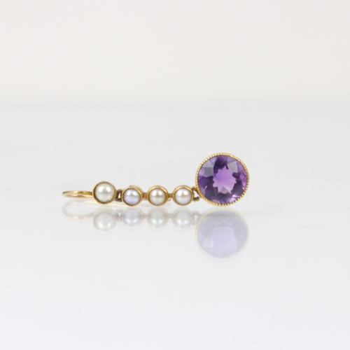 208 - A pair of early 20th century amethyst and seed pearl earrings, the four yellow metal milgrain set se... 