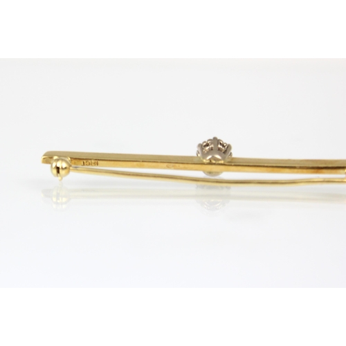 209 - A yellow metal diamond set bar brooch, the central round cut diamond upon yellow metal knife edge ba... 