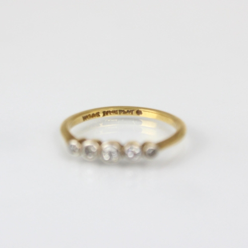 271 - An Edwardian style diamond five stone ring, the graduated round cut diamonds within white metal milg... 