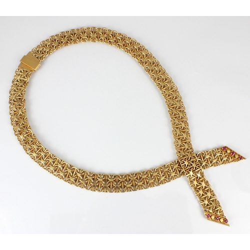 349 - A mid/late 20th century yellow metal ruby necklace, the chain mail style link leading to two crossed... 