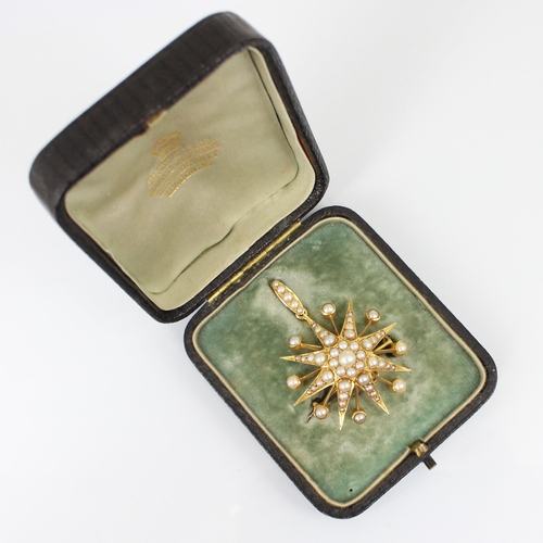 356 - A late 19th century split pearl brooch/pendant, the raised flowerhead designed centre within a star ... 