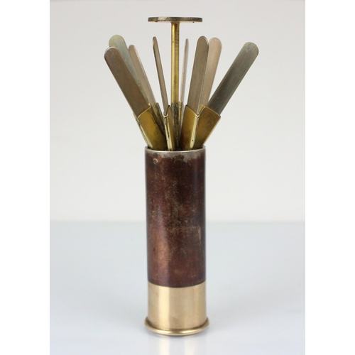 367 - A novelty Asprey butt marker, the oxidised copper cartridge with yellow metal mount (marked 9ct) wit... 