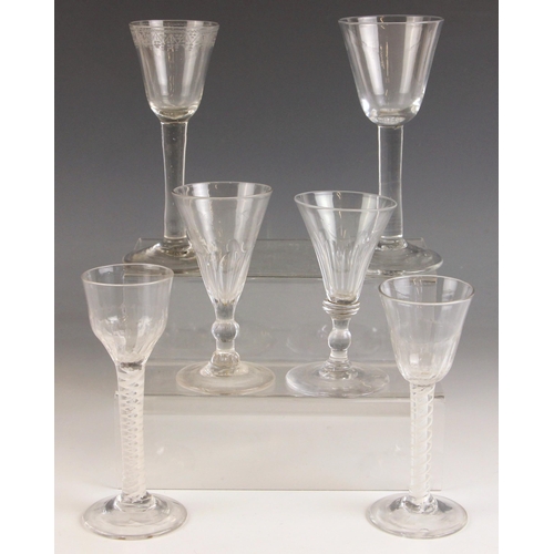 536 - An English wine or cordial glass, the half fluted funnel shaped bowl above a tapering double series ... 