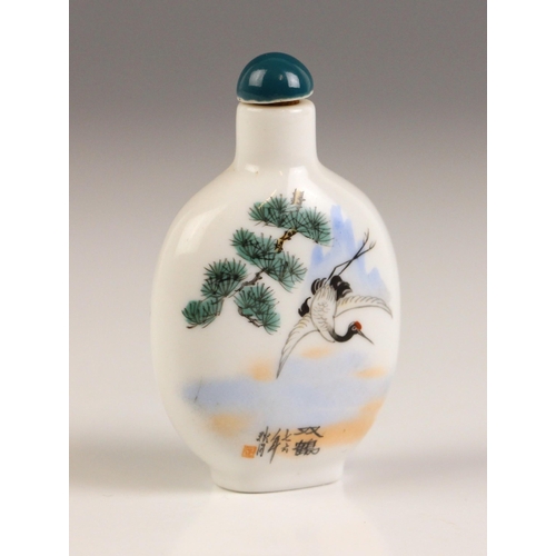 633 - A Chinese porcelain snuff bottle, 20th century, signed, of flatted ovoid form and painted with a cra... 