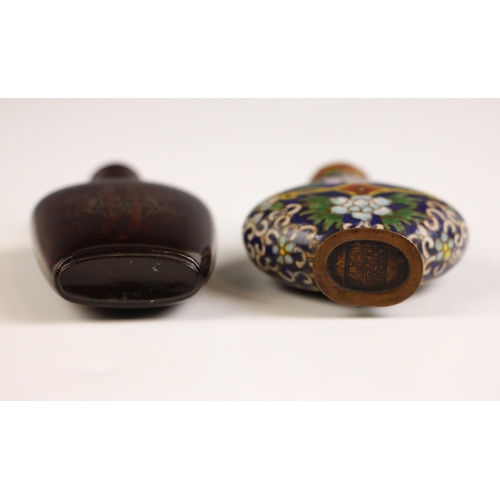 635 - A Chinese cloisonné snuff bottle, early 20th century, of flattened ovoid form and decorated in polyc... 