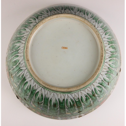 636 - A Chinese porcelain 'cabbage leaf' centre bowl, late 19th century, of large proportions and decorate... 