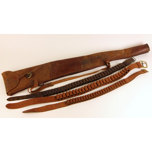 721 - A leather double shotgun slip, of typical form with buckled flaps and carry strap, 120cm long, with ... 