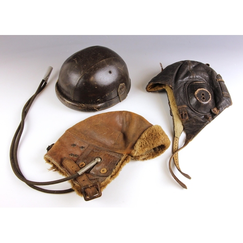 724 - WORLD WAR II INTEREST: A German Luftwaffe 'LKpW101' winter flight helmet, of five panel brown leathe... 