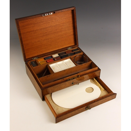 744 - An artist's watercolour box, 19th century, the mahogany box with hinged cover and lower drawer, cont... 