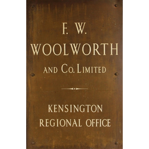 754 - ADVERTISING INTEREST: A cast bronze corporate office sign, early 20th century, the white text readin... 