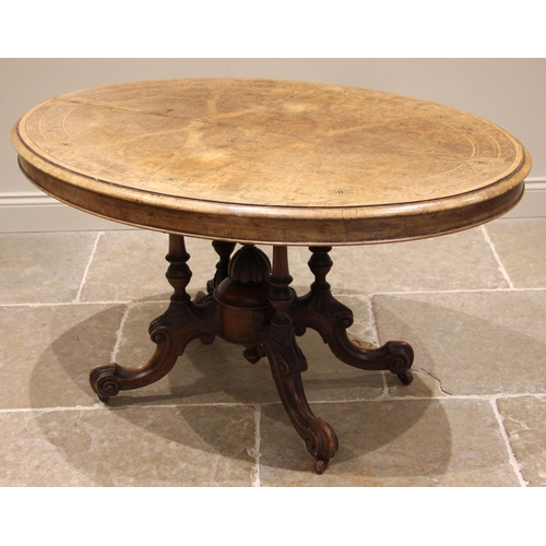 936 - A Victorian burr walnut centre/loo table, the quarter veneered oval top inlaid with roundels and str... 