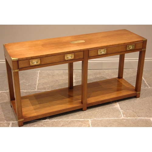 938 - A campaign style cherry wood console table, by Kennedy Furniture, late 20th century, the top centred... 