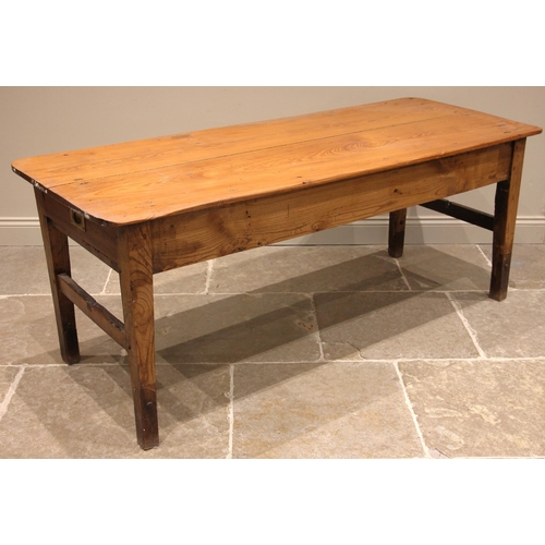 943 - A 19th century farmhouse kitchen table, probably French, the rectangular pine plank top with rounded... 