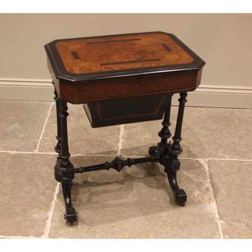 945 - A Victorian Aesthetic Movement ebonised and amboyna sewing table, the rectangular inlaid cover with ... 