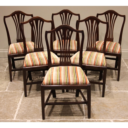 947 - A set of six Hepplewhite style mahogany dining chairs, 19th century, each with a pierced splat back ... 