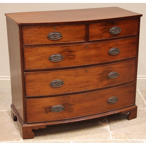 960 - A 19th century mahogany bowfront chest of drawers, formed with two short over three graduated long, ... 