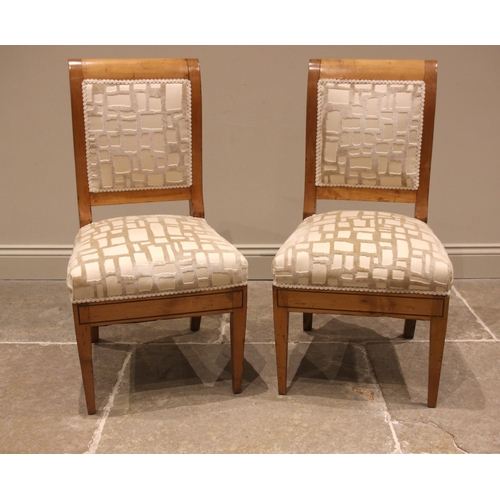 967 - A pair of Biedermeier satin birch side/bedroom chairs, 19th century, each with a scrolled back swept... 