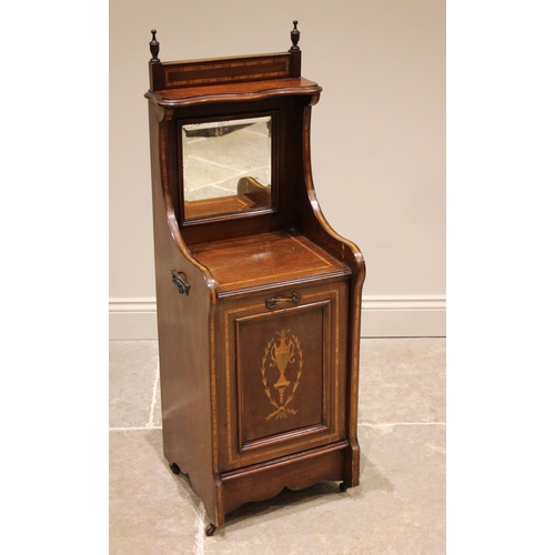 993 - An Edwardian mahogany and satinwood crossbanded coal purdonium, with a serpentine shelf over a mirro... 