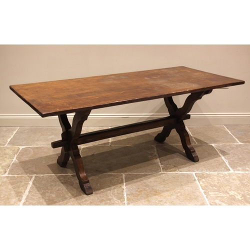 998 - A 17th century style oak refectory table, mid 20th century, the slab top upon 'X' frame supports uni... 