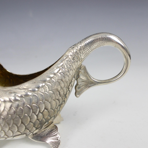 1 - A continental white metal novelty sauce boat, modelled as a fish with realistically engraved detail,... 