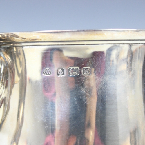 101 - A George V silver trophy, Adie Brothers Ltd, Birmingham 1937, the leaf capped twin handles above pla... 