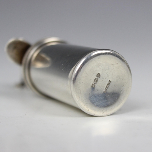 113 - An early 20th century silver scent atomiser, import marks for London 1913, of cylindrical form with ... 