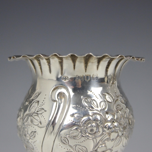 115 - An Edwardian silver posy vase, William Comyns & Sons, London 1902, the shaped rim above florally emb... 