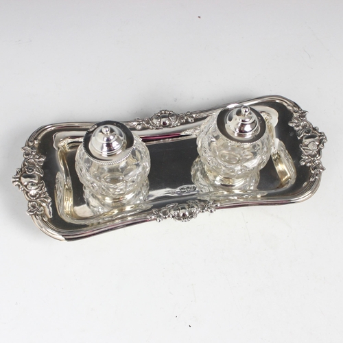 48 - A Victorian silver desk tidy, Josiah Williams & Co, London 1895, the shaped rectangular tray with fl... 