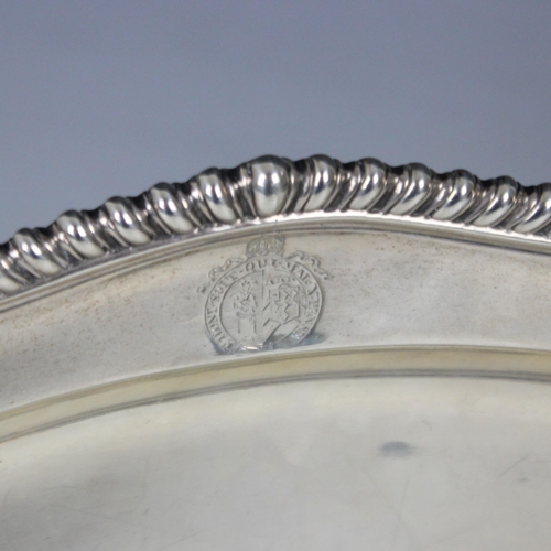 90 - A George II silver serving dish, indistinct makers mark, London 1759, the gadrooned rim above shaped... 