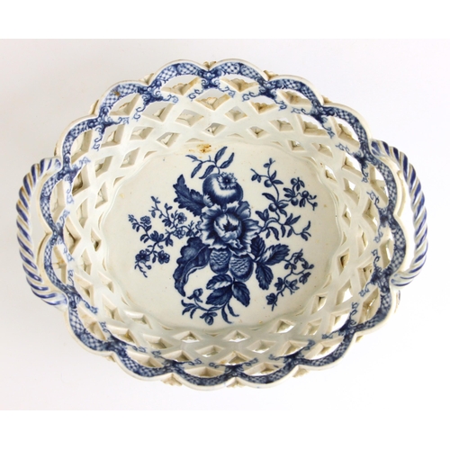 601 - An 18th century British porcelain chestnut basket, Lowestoft or Worcester, blue and white transfer p... 