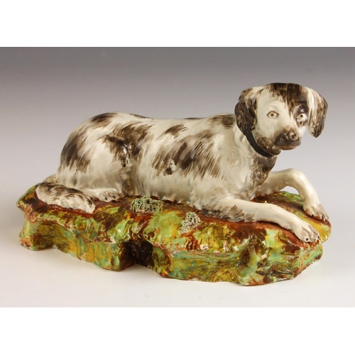 611 - A Staffordshire pearlware pottery setter dog, probably by Enoch Wood works, or Neale & Co, circa 182... 