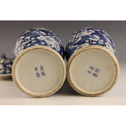 626 - A pair of Chinese porcelain blue and white vases, 19th century, each of high shouldered baluster for... 