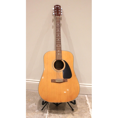 755 - A Fender acoustic guitar and stand, serial number CK 98030930, made in China, 105cm, along with a Fe... 