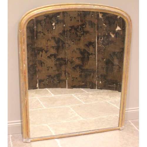 952 - A 19th century gilt wood overmantel wall mirror, the moulded frame of arched form, 132cm H x 111cm W