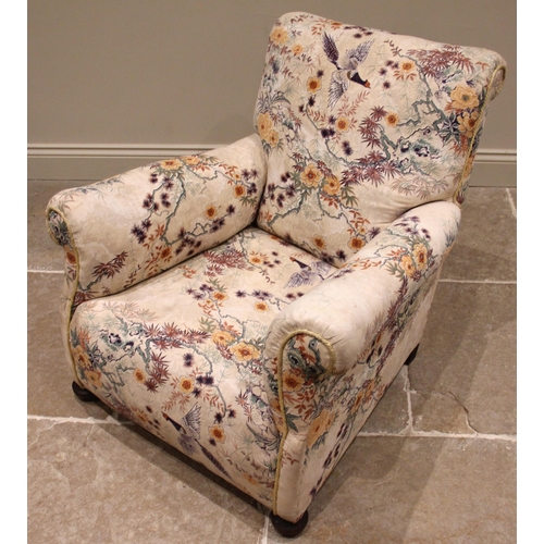 957 - A deep-seated armchair in the manner of Howard & Sons, late 19th/early 20th century, later re-covere... 