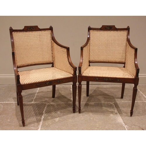 978 - A pair of Sheraton revival satinwood and bergere chairs, late 19th/early 20th century, each with pai... 